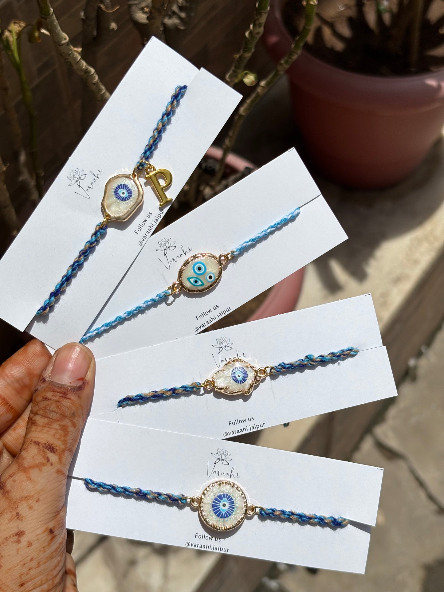 Braided Luxe Pearl Evil Eye Rakhi