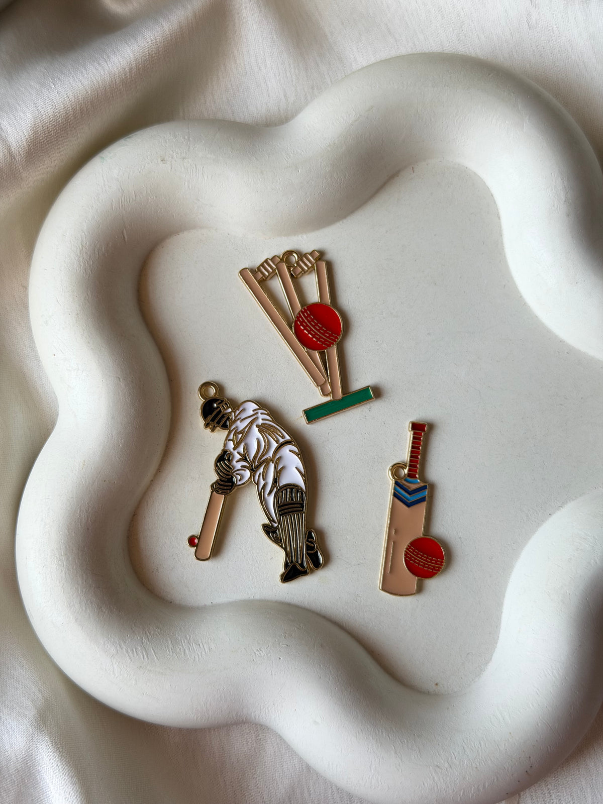 Cricket charms
