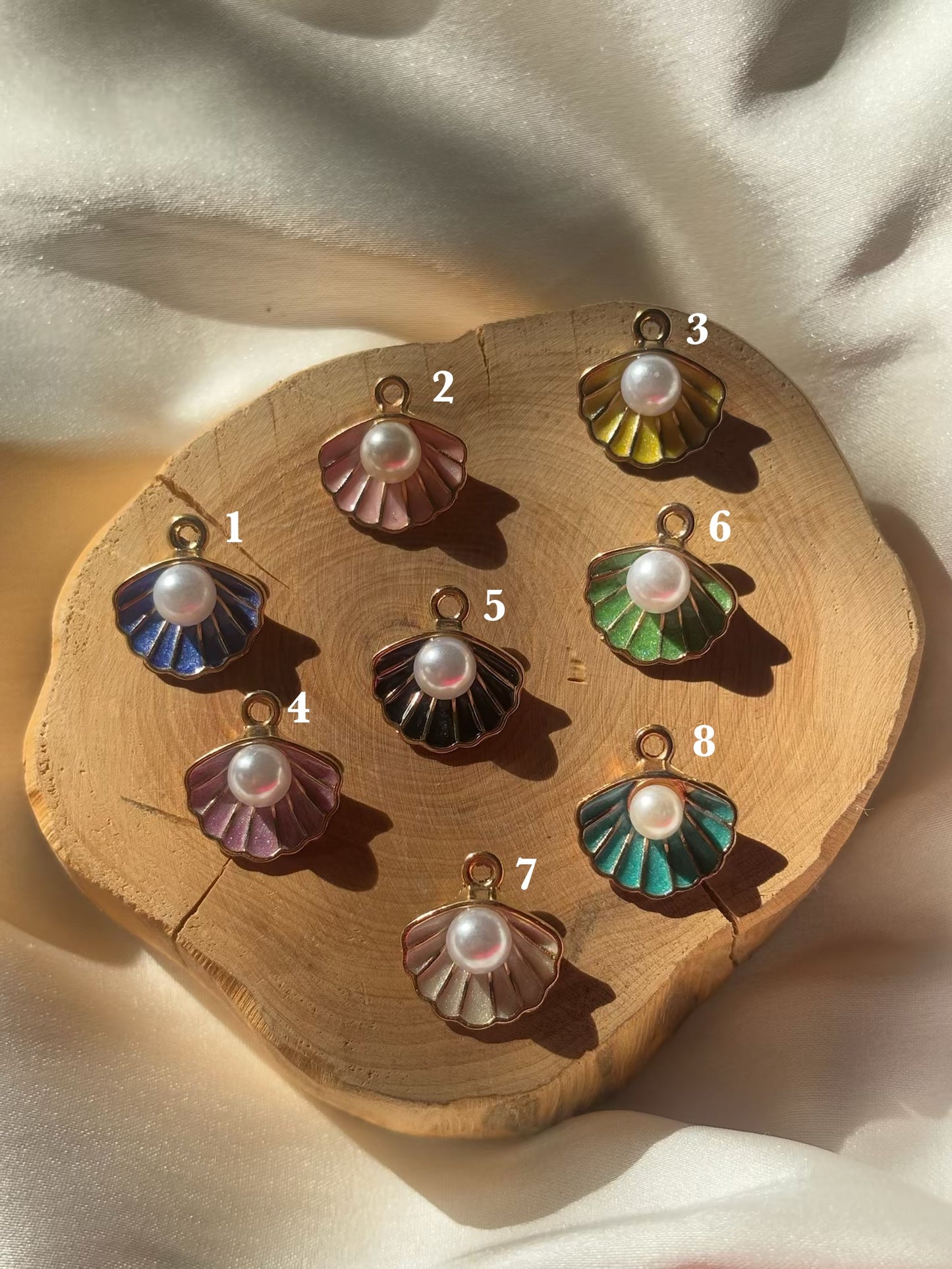 Shell pearl charm