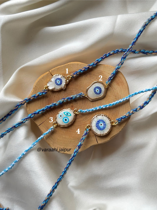 Braided Luxe Pearl Evil Eye Rakhi