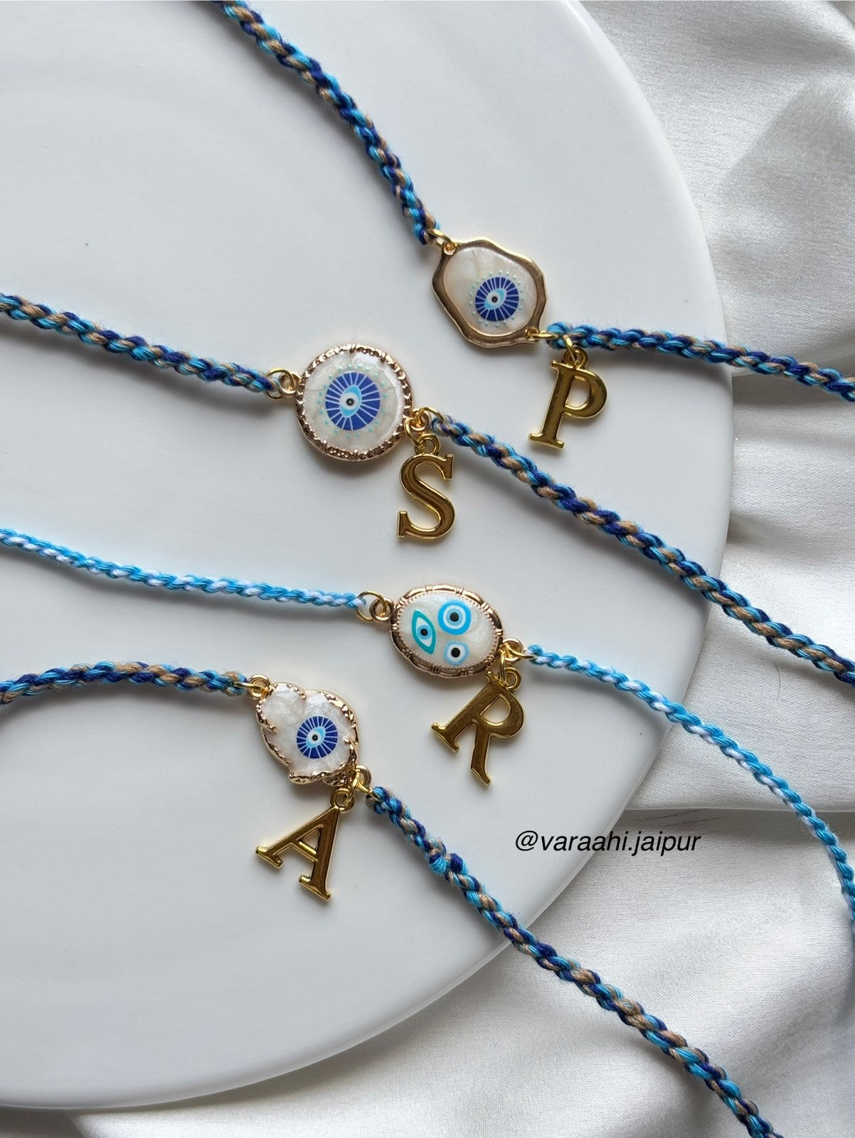 Braided Luxe Pearl Evil Eye Rakhi