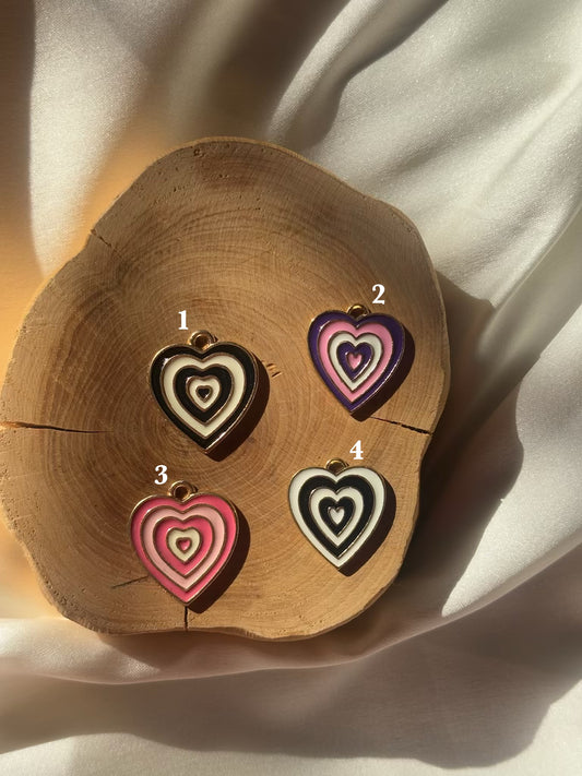 Hypnotic heart charms